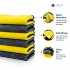 A stack of folded microfiber cloths in yellow and dark gray with black trim, shown on a white background with feature callouts: super absorbent, soft & plush, and quick dry. LEPFCART logo appears at the top right.
